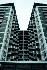 Low-angle view of a modern building against the sky