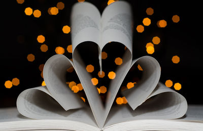 Detail shot of a book with pages forming hearts