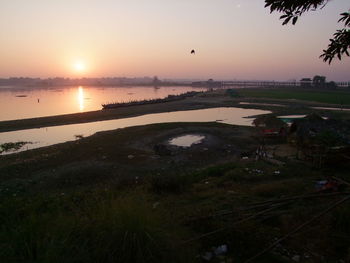 Scenic view of sea against sky during sunset