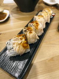 Close-up of sushi in plate on table