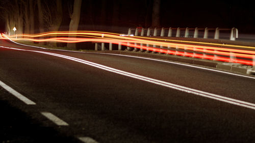 Light trails on road at night