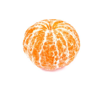 Directly above shot of orange slice against white background