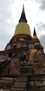 Low angle view of temple building against sky