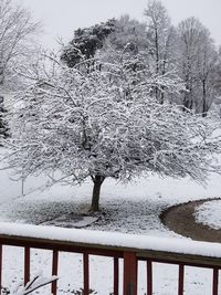 Snow covered landscape against clear sky