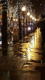 Illuminated street lights at night