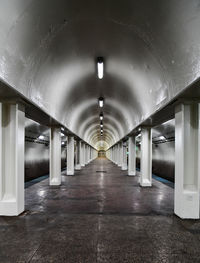 Empty underground urban subway station platform