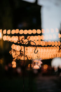 Close-up of illuminated lights at night