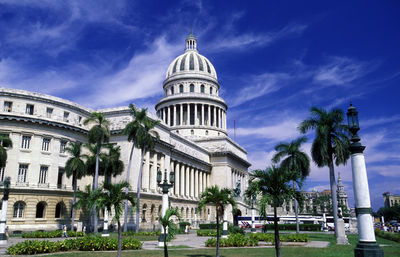 Capitol building against sky in city