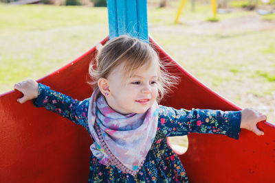 Portrait of happy girl in playground