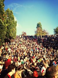 Group of people in front of crowd