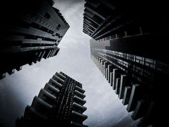 Low angle view of skyscrapers against sky