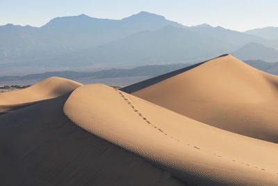 Scenic view of desert against sky