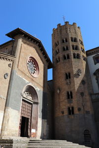 Low angle view of historic building against sky