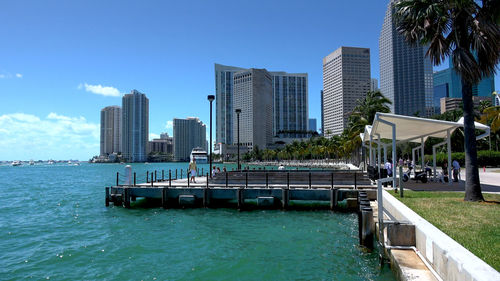 View of swimming pool against buildings