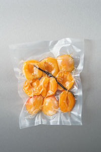 High angle view of orange fruit on table