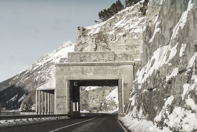 Empty road passing through mountain