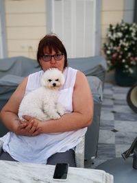 Portrait of woman with dog