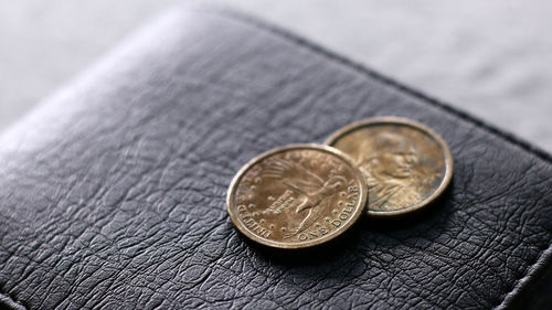 Close-up of coins on table