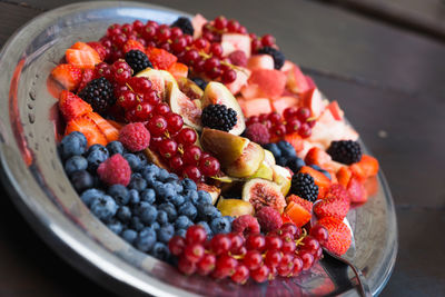 High angle view of strawberries in bowl on table