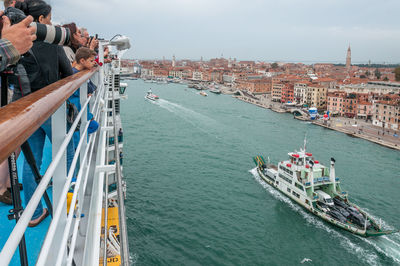 Panoramic view of boats in sea against sky