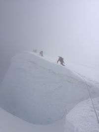 Scenic view of snow covered mountain against sky