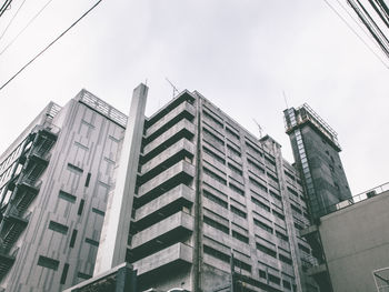 Low angle view of modern building against sky