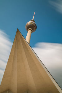 Low angle view of television tower against sky