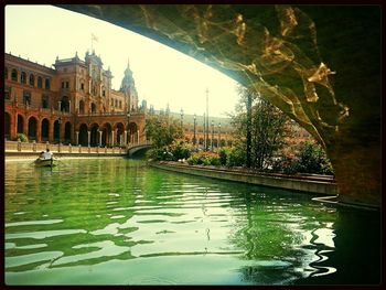 View of canal in city