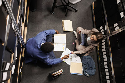 High angle view of man working in workshop