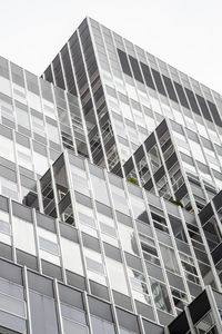 Low angle view of modern building against clear sky