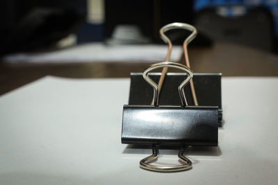 Black paperclip tool