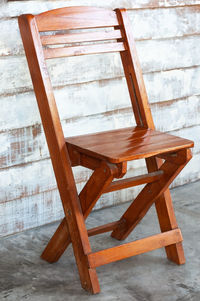 High angle view of chair on table