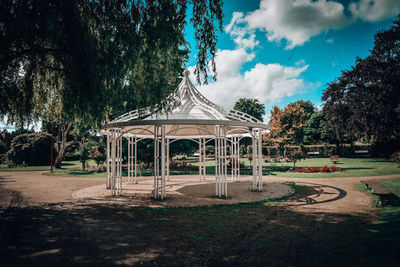 Gazebo in park against sky