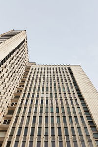 Low angle view of modern building against clear sky