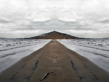 Scenic view of desert against sky