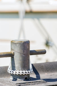 Rope of boat attached to bollard