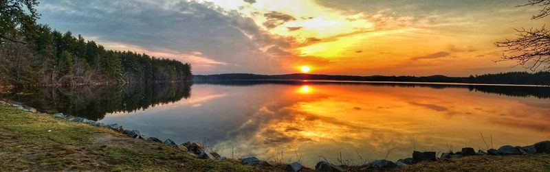 Scenic view of lake against sky during sunset