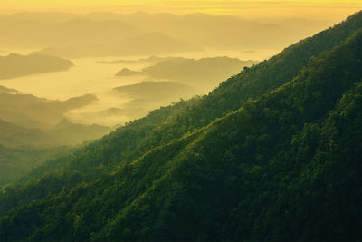 Scenic view of landscape against sky during sunset