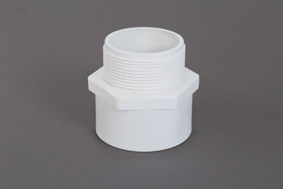 Close-up of white candle on table