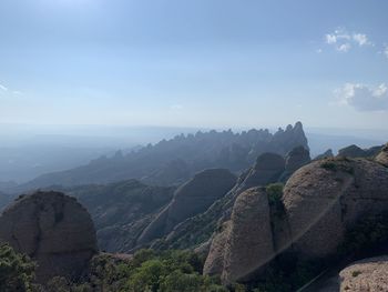 Scenic view of rocky mountains against sky