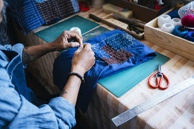 High angle view of man working on table