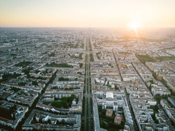 High angle view of buildings against sky during sunset