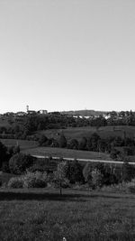 Scenic view of field against clear sky