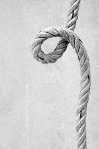 Close-up of rope tied to metal