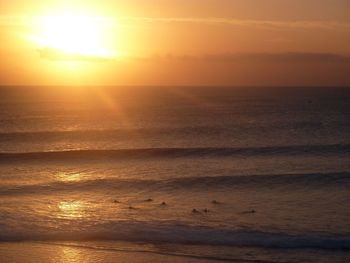 Scenic view of sea at sunset