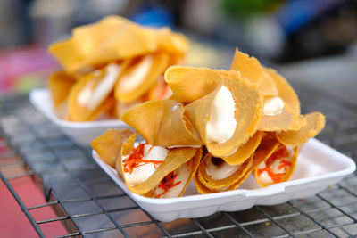 Close-up of fries in plate on table