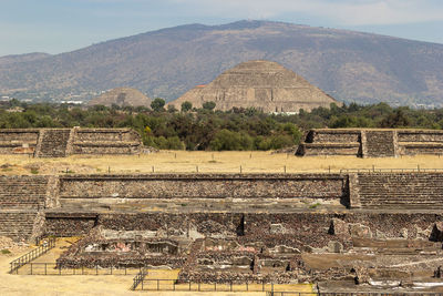 Pyramid of the sun against mountain