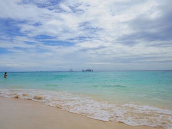 View of sea against cloudy sky