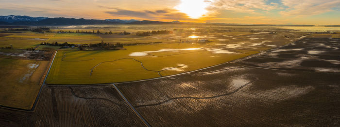 Skagit valley farmland. morning greets the glistening farm fields after a heavy rainfall. 