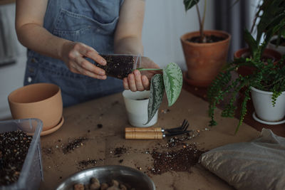 Midsection of man preparing food